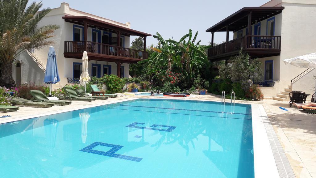 Aparthotel Paradise Garden Gumusluk Evleri Extérieur photo